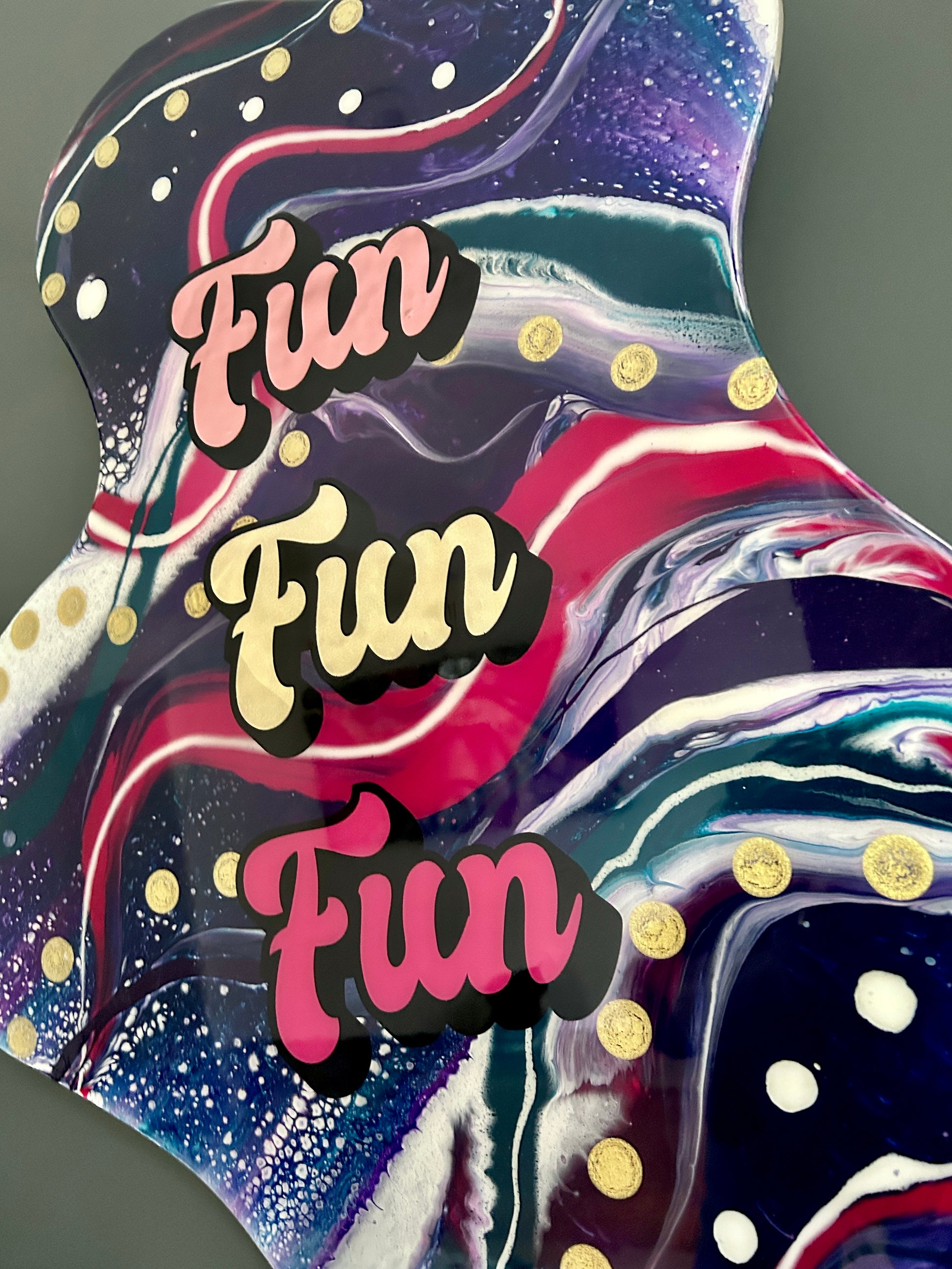 Fun bright and bold unique resin coated acrylic pour artwork in pinks, purples and blues with Fun Fun Fun type. Handmade in the uk by GCC Artworks